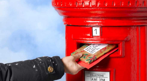 Christmas post hand posting mail